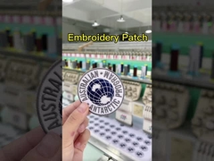 注文の刺繍された帽子のパッチの紙の裏地の服のための刺繍のパッチ